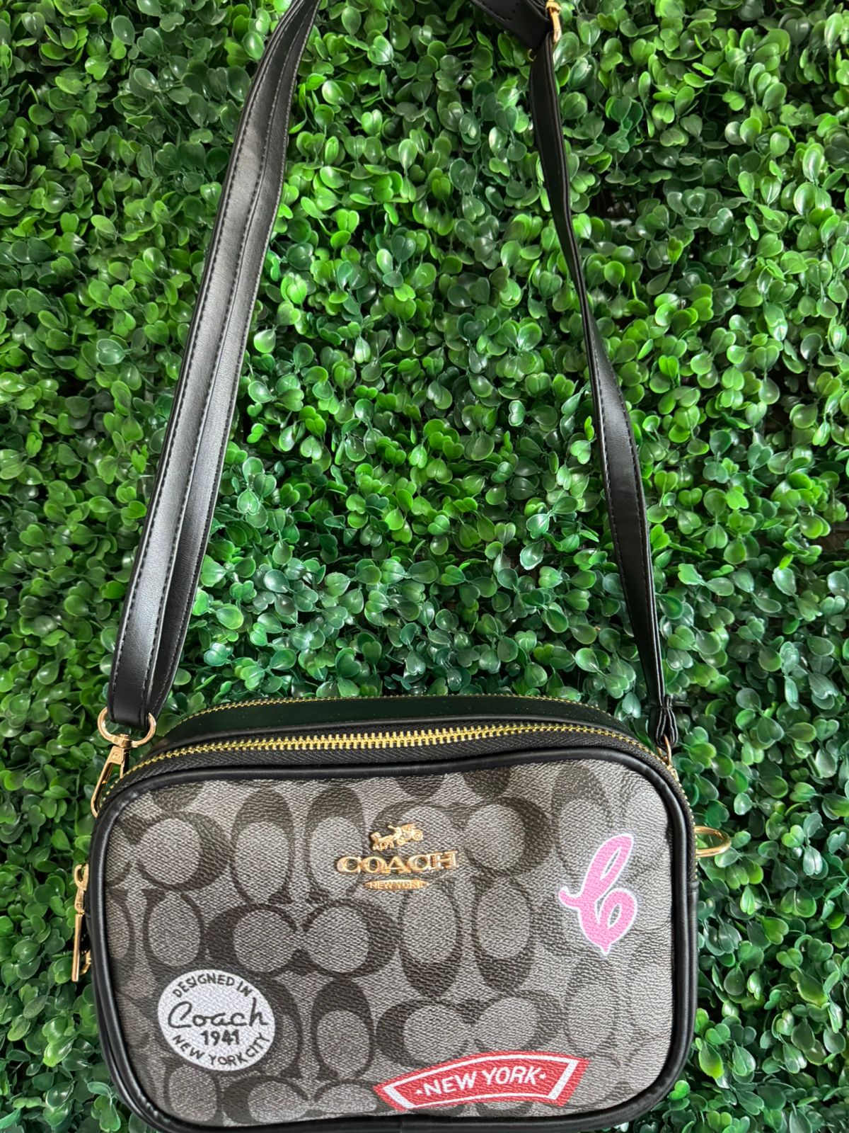 A BANDOLERA COACH NEGRA