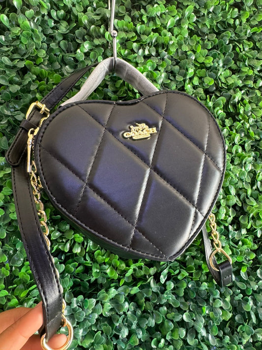 A BOLSA COACH CORAZON NEGRA
