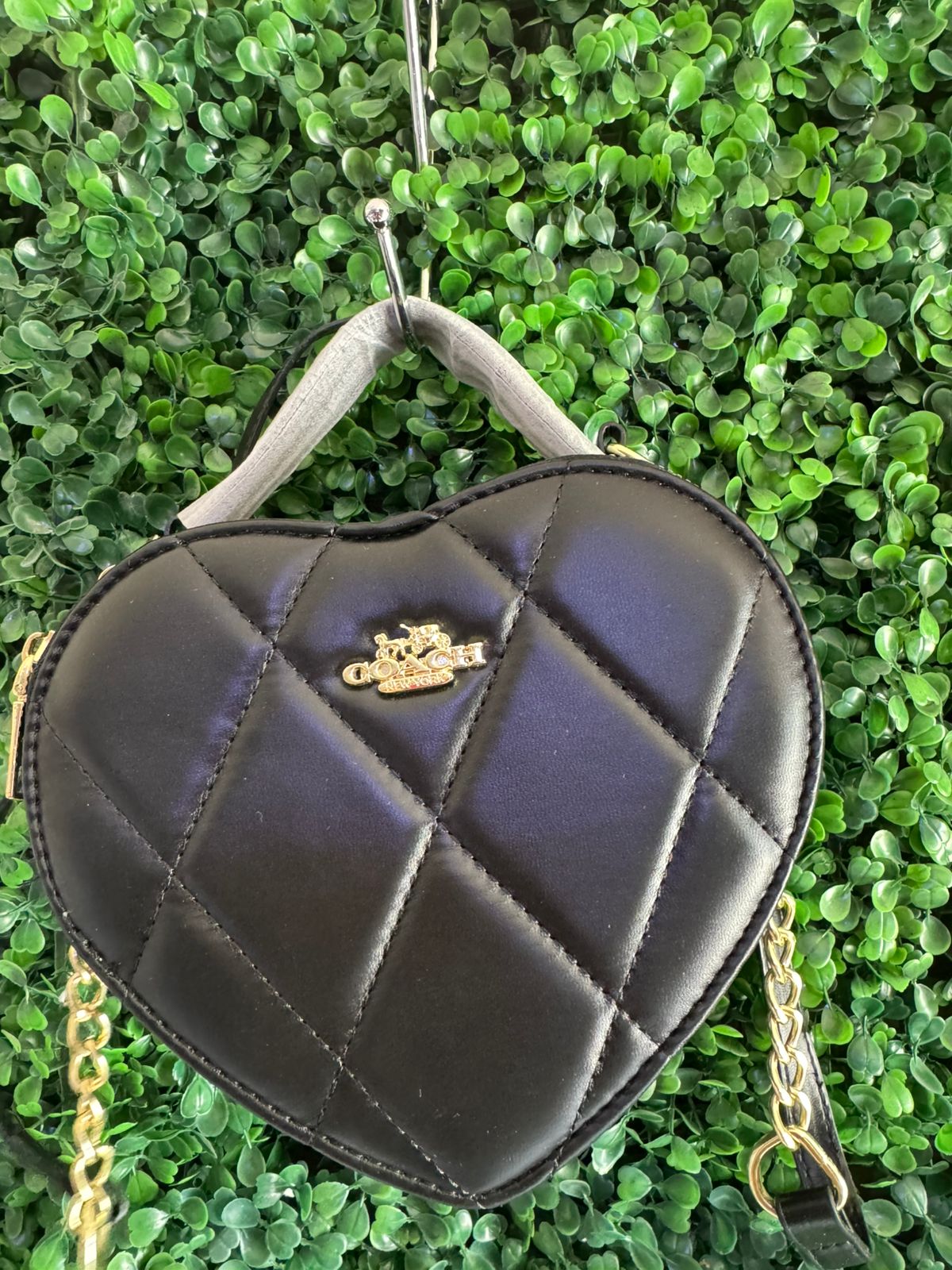 A BOLSA COACH CORAZON NEGRA