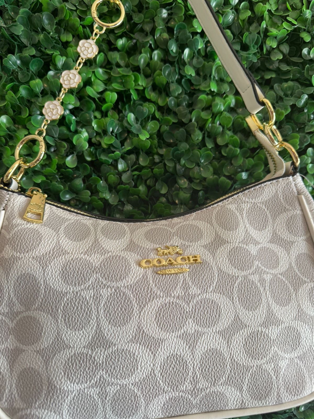 A BOLSA COACH GRIS BLANCO