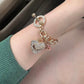 Juicy Couture: Icon Bracelet — Gold & Crystal Edition