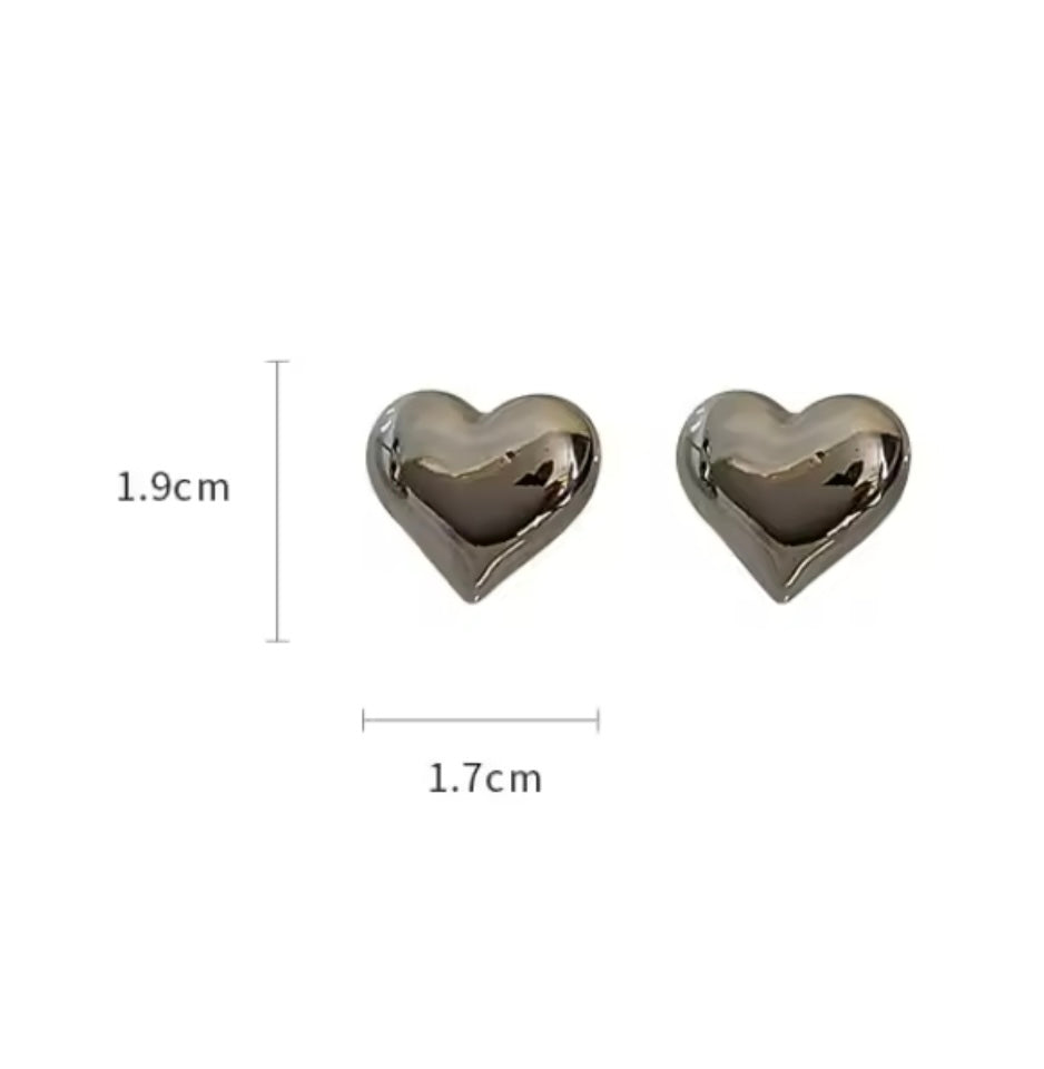 Pendientes bonitos de corazón estereoscópicos simples a la moda para mujer Tono Plateado