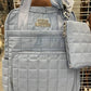 Mochila / pañalera Steve Madden Gris