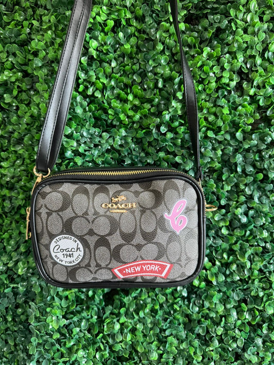 A BANDOLERA COACH NEGRA