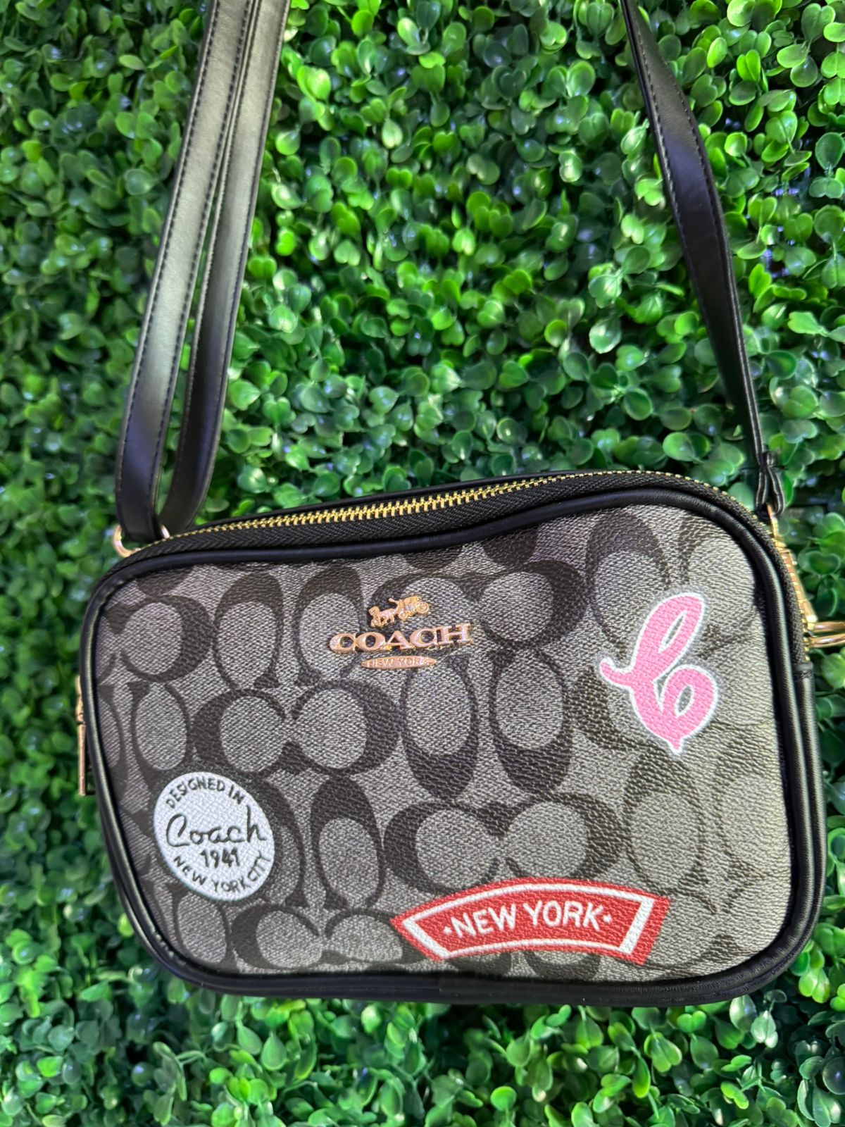 A BANDOLERA COACH NEGRA
