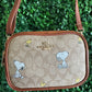 A BANDOLERA SNOPPIE INSPIRACION COACH CAFE