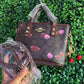 A BOLSA COACH CAFE LLAVERO CEREZAS CAFE