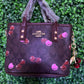 A BOLSA COACH CAFE LLAVERO CEREZAS CAFE