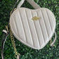 A BOLSA COACH BLANCA CORAZON