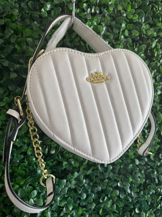 A BOLSA COACH BLANCA CORAZON