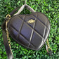 A BOLSA COACH CORAZON NEGRA