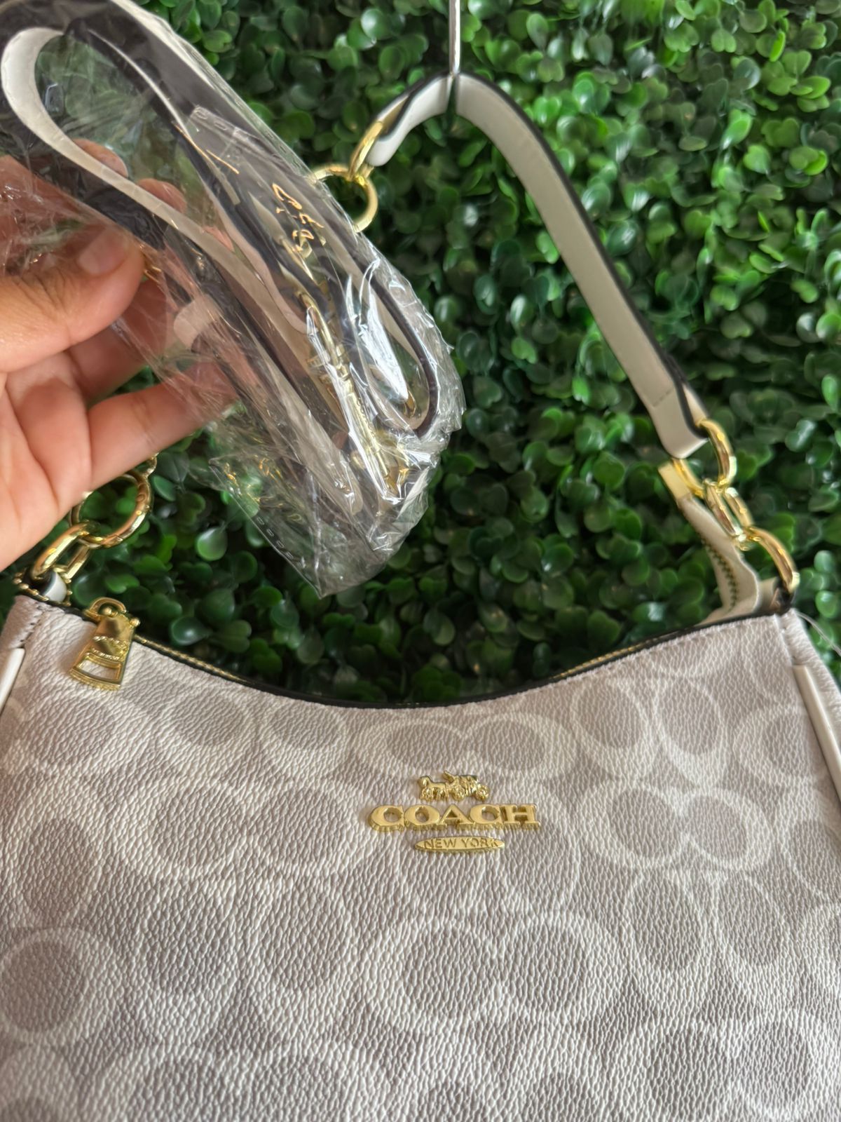 A BOLSA COACH GRIS BLANCO