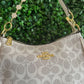 A BOLSA COACH GRIS BLANCO